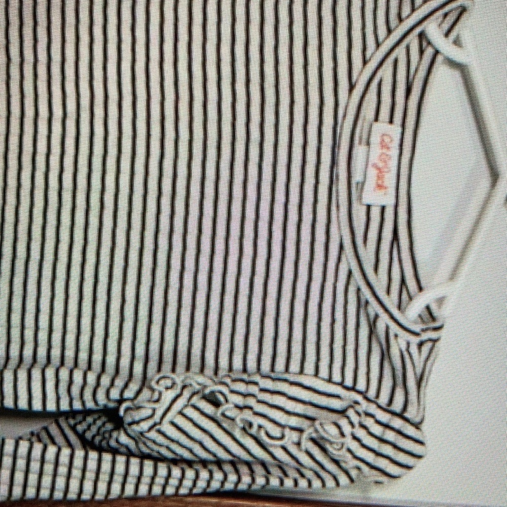 Showcase a timeless striped pattern sleeve shirt